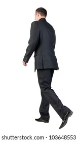 Back View Of Walking  Business Man.  Going Young Guy In Black Suit. Isolated Over White Background. Rear View People Collection.  Backside View Of Person.