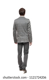 Back View Of Walking Business Man. Going Young Guy In Gray Suit. Rear View People Collection. Backside View Of Person. Isolated Over White Background. Young Businessman Passing By