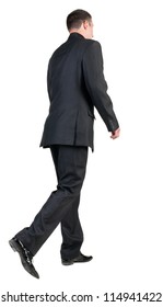 Back View Of Walking  Business Man.  Going Young Guy In Black Suit. Isolated Over White Background. Rear View People Collection.  Backside View Of Person.