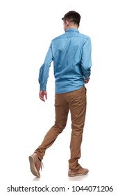 Back View Of A Walking Casual Man Looking To Side On White Background