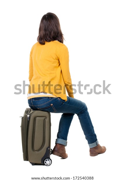 カーディガンで歩く女性がスーツケースに座るのを見ると動いている美しい女の子 人の背景のビュー Rear View Peopleコレクション 白い背景に の写真素材 今すぐ編集