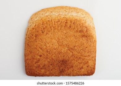 Back View Of Wholemeal Bread Slice Isolated On White Background