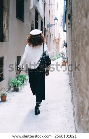 Similar – Image, Stock Photo Anonymous woman with backpack in boarding bridge