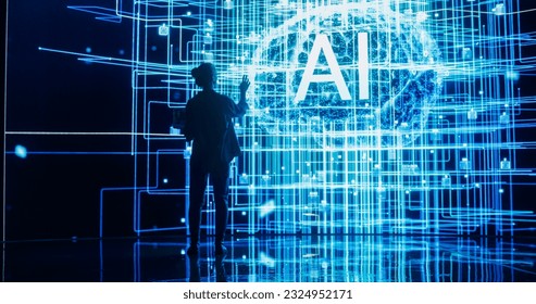 Back View of Woman Holding Laptop Computer, Standing Next To a Big Digital Screen and Interacting with AI Neural Network 3D Visualization. Professional Female Manager Analysing Information in Big Data - Powered by Shutterstock