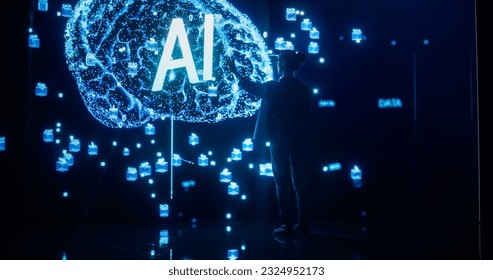 Back View of a Woman Holding Laptop Computer, Standing in Front of Big Digital Screen with AI Neural Network 3D Visualization. Professional Data Scientists Activating Artificial Inteligence System - Powered by Shutterstock