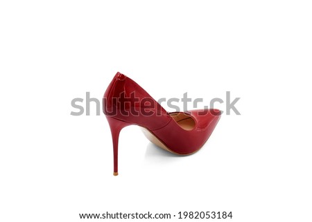 back view women's red high-heeled shoes made of glossy leather on a white background. Isolate