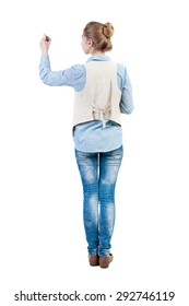 back view writing beautiful woman  Young girl in jeans draws  Rear view people collection   backside view person  Isolated over white background  Girl in sleeveless felt  tip pen draws wall 
