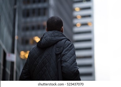 Back View Of Young African American Professional Walking To Work. Photographed In NYC In November.