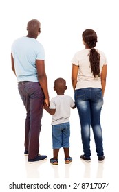 back view of young african family holding hands isolated on white