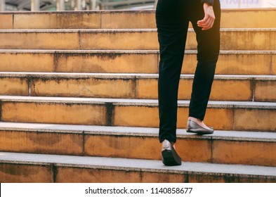 Back View Of Young Business Woman Walking  Stepping Up Stairs Going To Work Time At Morning In The City, Determination, Confidence, Lifestyle, Teamwork, Rush Hour, Grow Up And Successful Concept