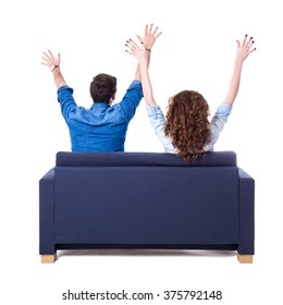 Back View Of Young Cheerful Couple Sitting On Sofa Isolated On White Background