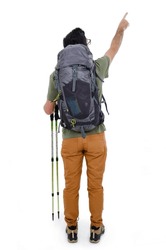 Back View Of A Young Hiker Points At Wall Isolated On White Background. Rear View Of Young Hiker Standing Looking Up On Copy Space. Studio Shot