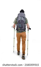 Back view of a young hiker walking  isolated on white background. Rear view of young hiker walking away, with backpack and gear. Studio shot
					