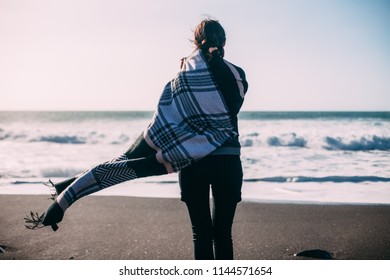 Back View Of Young Lonely Woman Enjoying Ocean. Depression