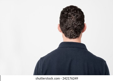 Back View Of Young Man Isolated Over White