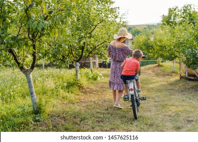 small boy driving bike