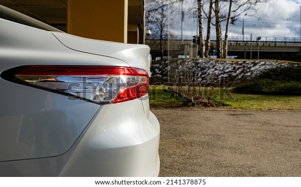 Back of white car. cars\
back light