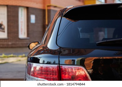 Back window of a car parked on the street in summer sunny day, rear view. Mock-up for sticker or decals - Shutterstock ID 1814794844