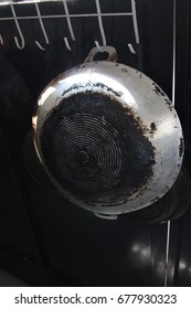 Back Of Wok. Black Dirty Carbon Side Of Used Wok