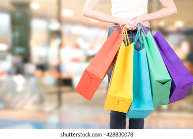 back-women-holding-shopping-bag-260nw-42