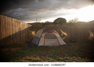 Back yard camping under stormy skies
