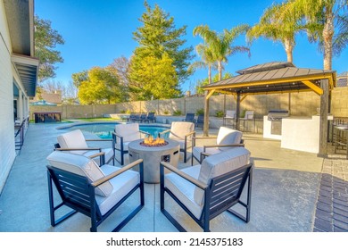 Back yard patio with a pool  - Shutterstock ID 2145375183