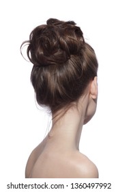 Back Of Young Slim Woman With Fancy Prom Hair Bun