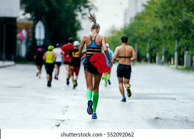Back Young Woman Runner Running In City Marathon Compression Socks