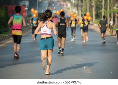 Back Young Woman Runner Running In City Marathon Compression Socks