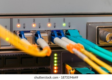 Backbone High-speed Internet Communication Channel. Fiber Optic Cable Are Connected To The Interfaces Of The Central Router. Modern Equipment Of The Data Processing Center