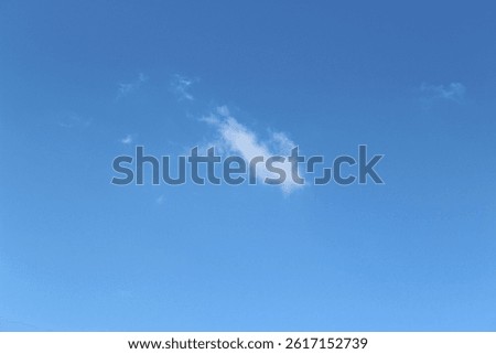 backdrop off cloud whisp in blue sky 