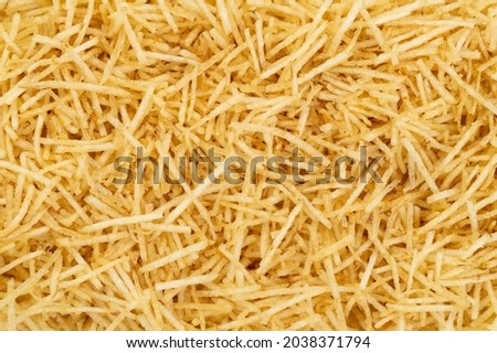 Backdrop of potato straw or shoestring potato.