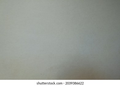 Backdrop - simple cream white paperboard from above