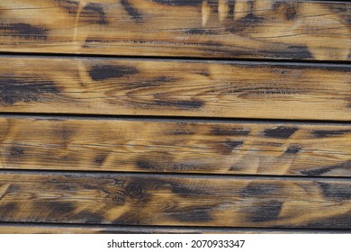 Backdrop - wall made of burnt and brushed wooden planks