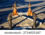 Backflow prevention device, which is an assembly of valves and pipes designed to ensure water flows in a single direction and prevent contamination of potable water supplies
