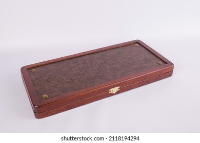 Backgammon Closed From Wood. On White Background