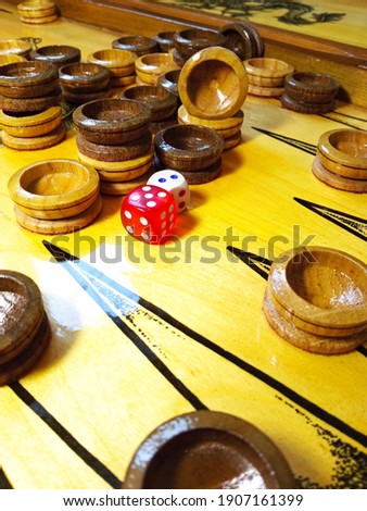 Backgammon, other common names: trick-track, backgammon, tavla, shesh-besh, kosha - a board game for two players on a special board divided into two halves.