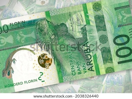 Background of 100 Florin banknote,Group of money stack of 100 Florin Aruba banknote a lot of the background texture, top view