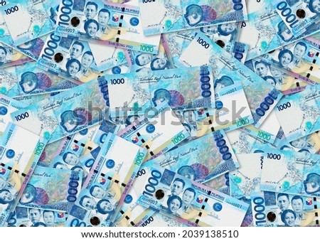 Background of 1000 Philippinas Piso banknote,Group of money stack of 1000 Philippine banknote a lot of the background texture, top view