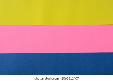 Background Of 3 Layers Of Solid Colored Paper, Yellow, Pink, Blue, Pansexual Flag