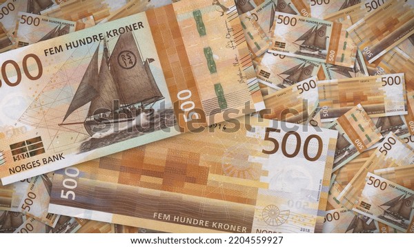 Background of 500 Norwegian krone banknote,Group of\
money stack of 500 Norway krone banknote a lot of the background\
texture, top view