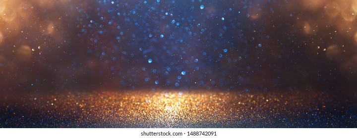 background of abstract glitter lights. blue, gold and black. de focused. banner - Shutterstock ID 1488742091