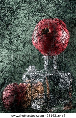 Background of abstract interwoven plastic thread against a backdrop of various objects