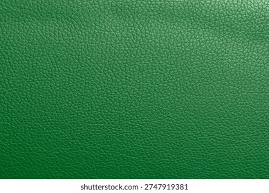Background Abstract pattern texture.Green leather texture background.Use for jacket sofa book cover tag shoes.Rich Green leather jacket close up, macro Green leather jacket texture, soft rugged grain pattern surface fashion design bg