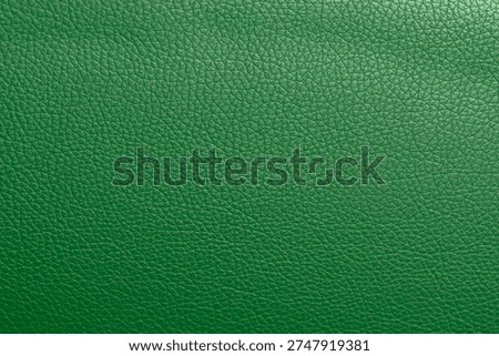 Background Abstract pattern texture.Green leather texture background.Use for jacket sofa book cover tag shoes.Rich Green leather jacket close up, macro Green leather jacket texture, soft rugged grain pattern surface fashion design bg