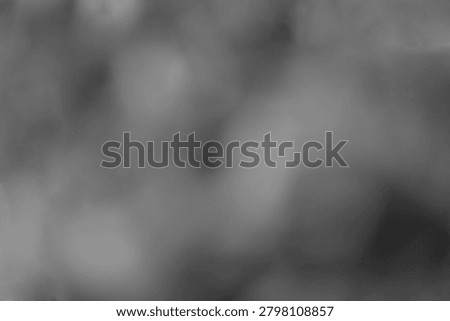 Background Abstract pattern texture.Grey bokeh lights on Clouds wallpaper soft focus artistic effect boke particles.Night Festival color bokey light backdrop Lens optical flare glare leak overlay bg silver coin fog smoke ash dove pewter graphite shadow iron lead pebble fossil