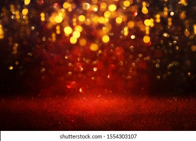 background of abstract red and gold glitter lights. defocused - Shutterstock ID 1554303107