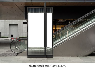 Background Advertisement Sign Mockup Blank Space, Light Box Stand Sign Hanging From Retail Storefront In City Town Center Shopping Mall Next To Escalator, White Empty For Add Business Logo Advert