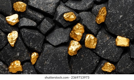 Background of amazing black granite stones and gold nuggets