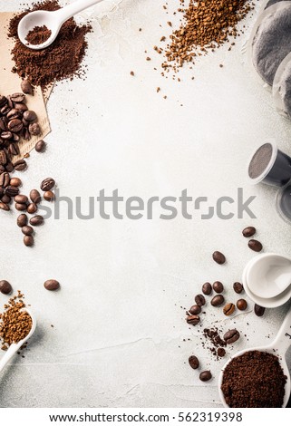 Background with assorted coffee, coffee beans, ground and instant, pads and capsules, retro style toned, copy space, top view.